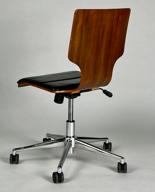 Walnut rolling desk chair with black padded seat