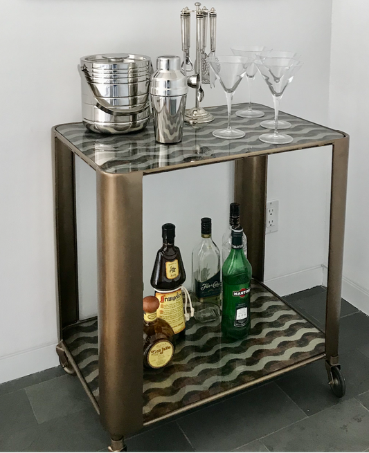 Antique brass finish bar cart with wheels, 2 tiers of wavy patterned antique mirrored glass