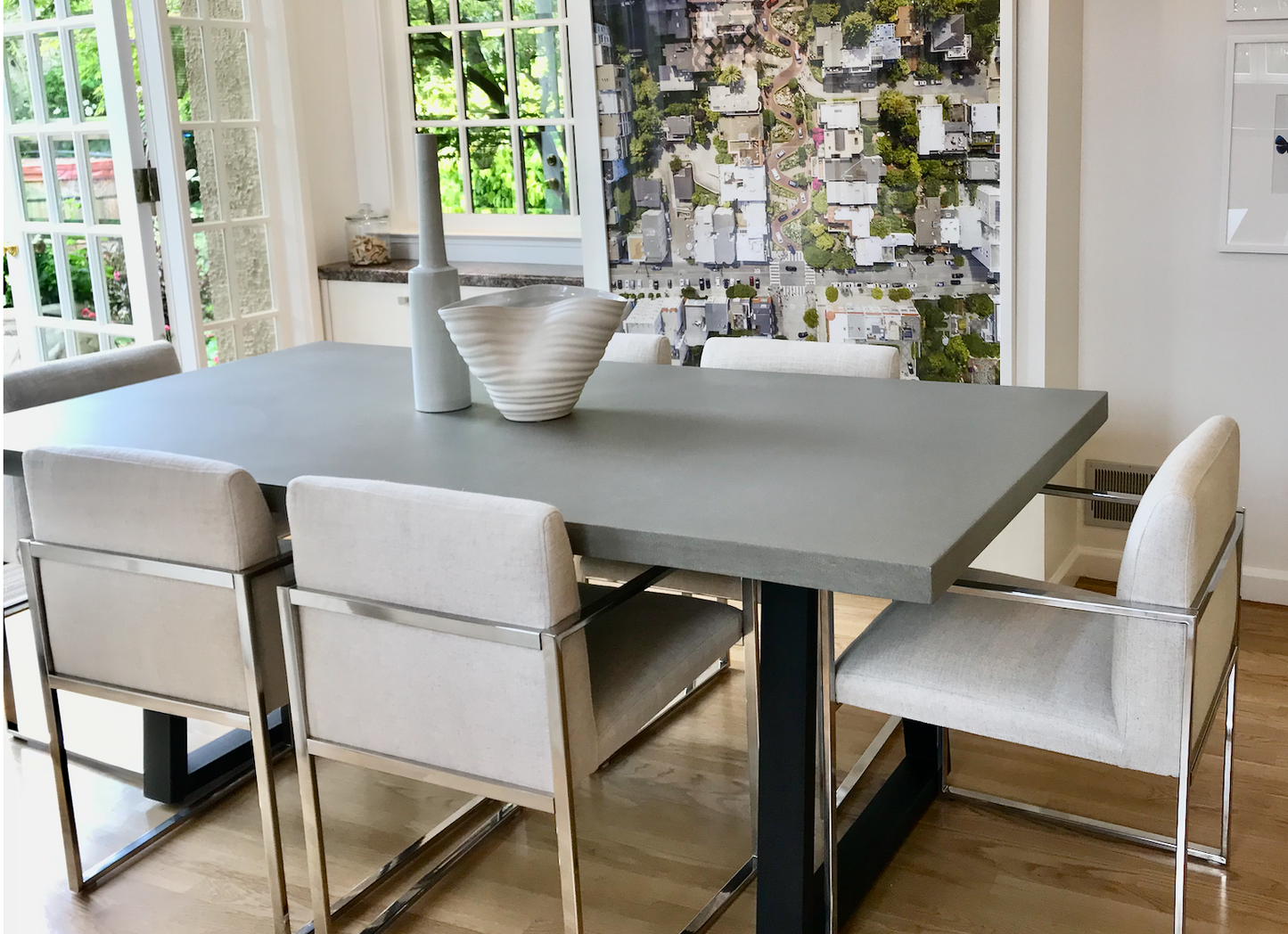 Gray poly resin top, matte black powder coated base dining table