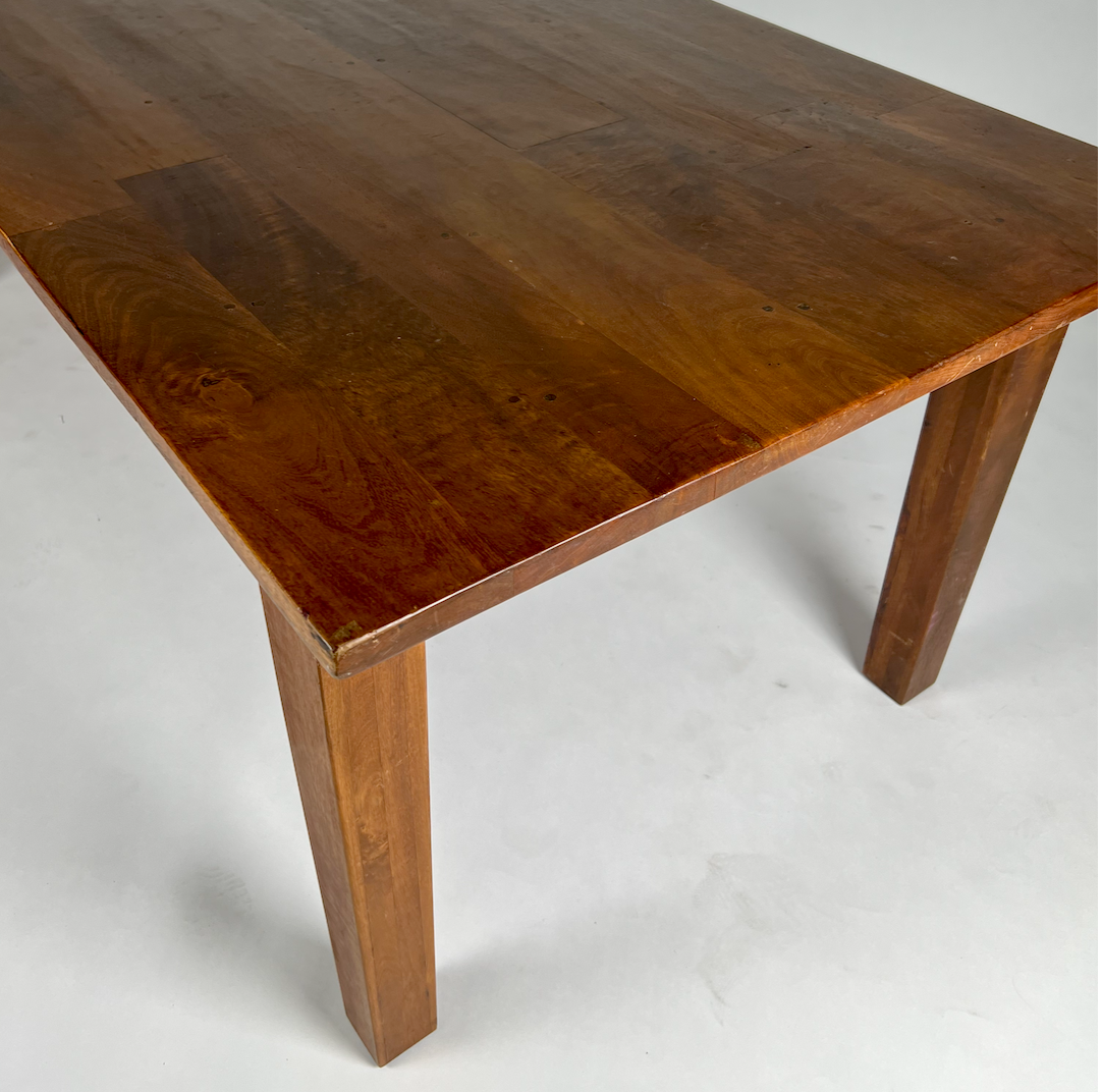 Warm brown wood rectangular farm house dining table