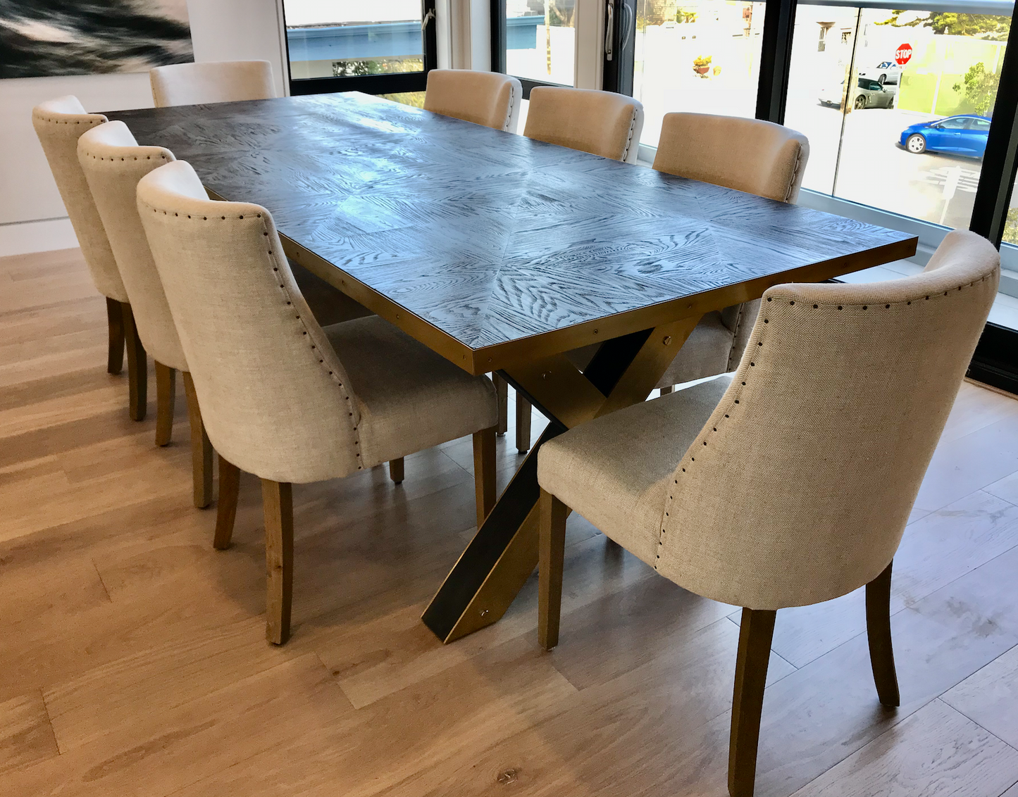 Brass X-base rectangular dining table with black oak veneer parquet pattern top