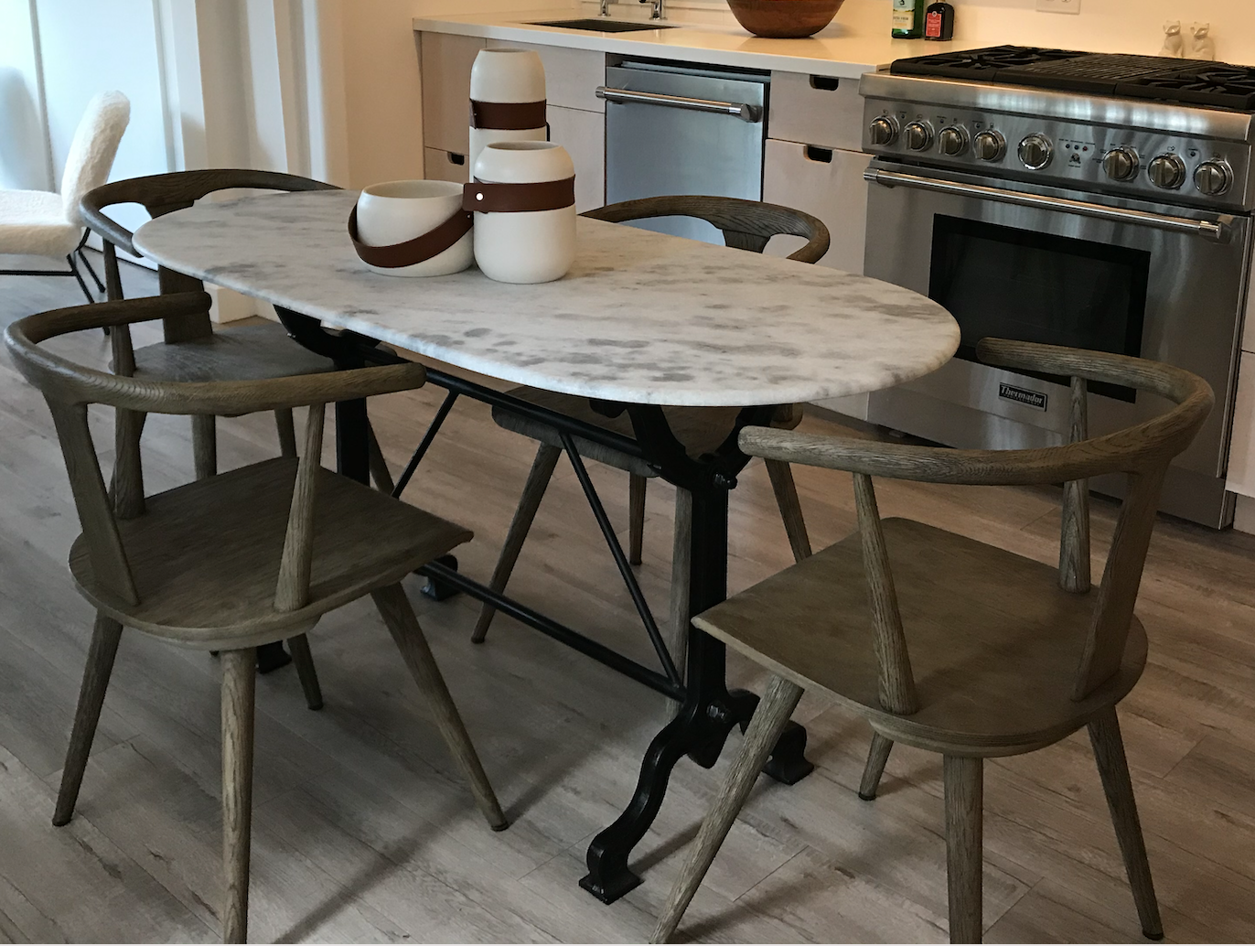 White and gray marble, racetrack shaped table or desk, black iron base