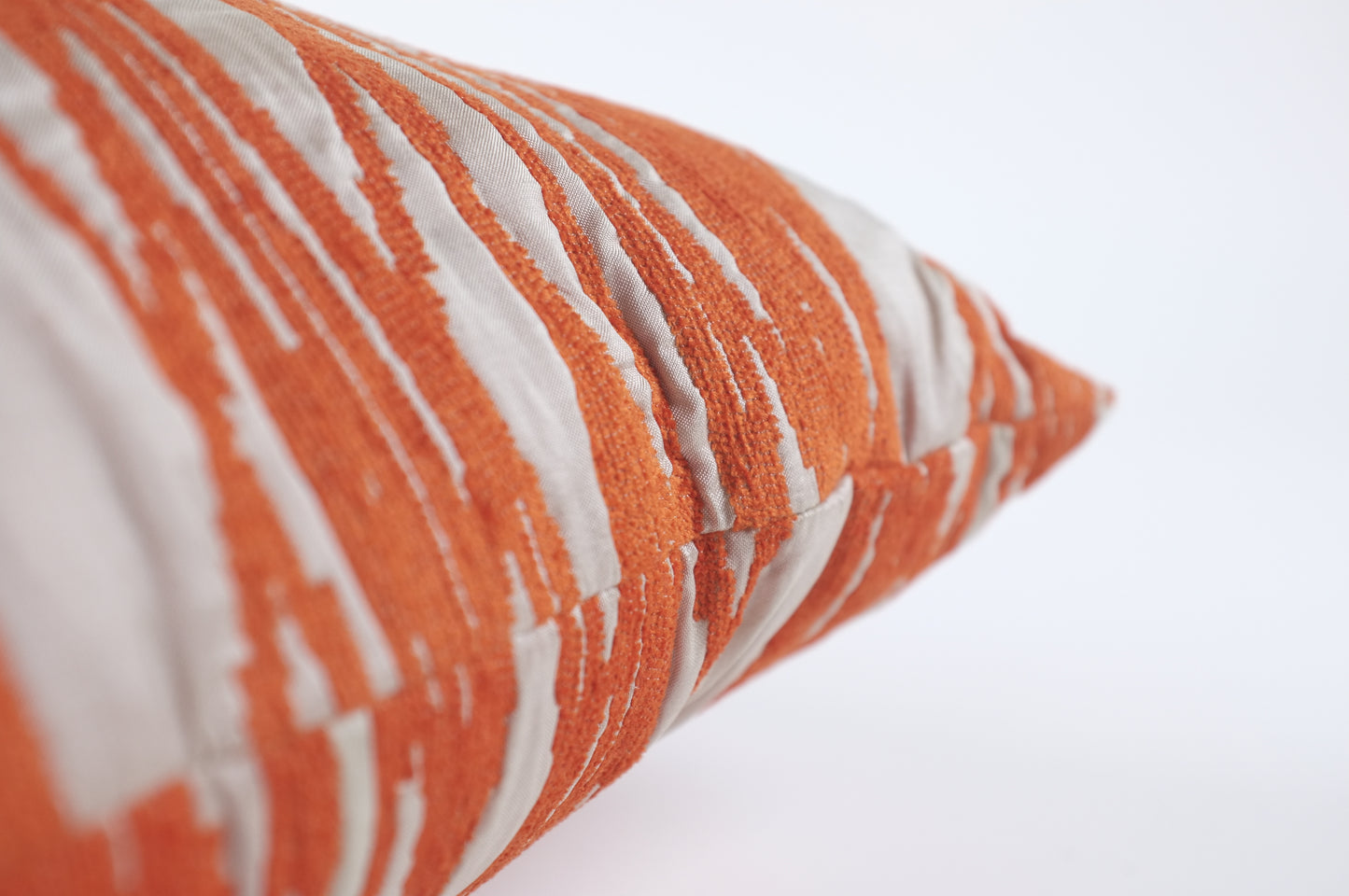 Lumbar with orange random stripes