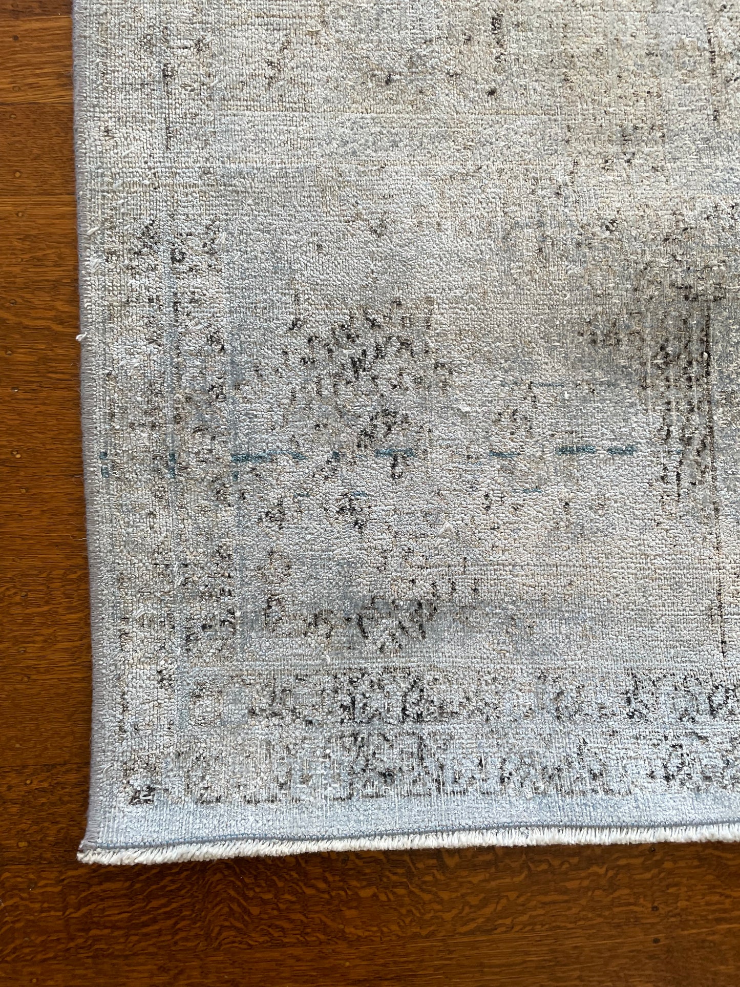 9'4" x 12'1" silk over dyed pale blue vintage rug