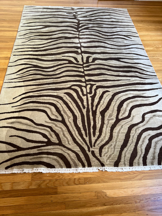 6x9'5"  Zebra pattern in brown & tan