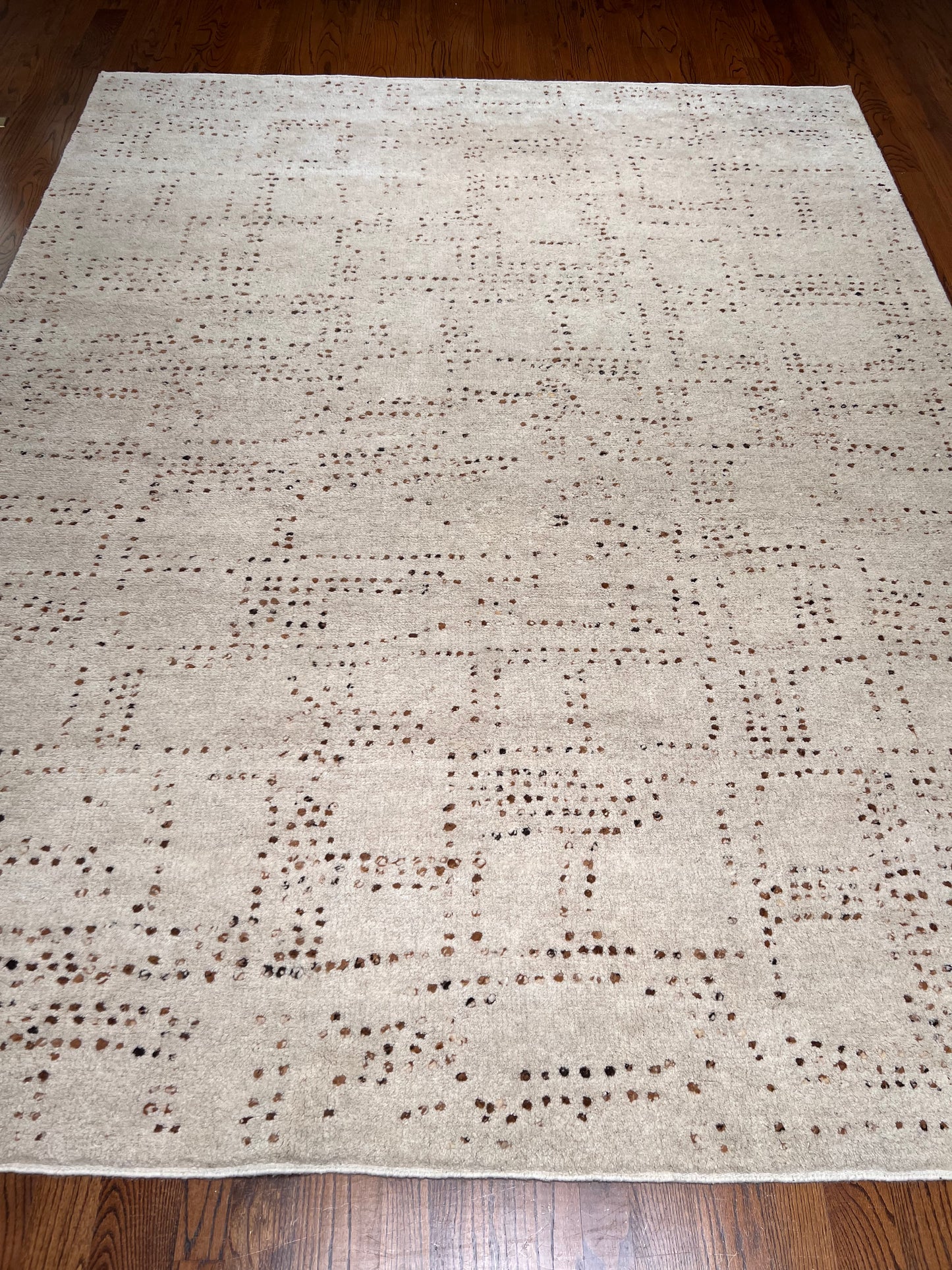 9'1" x 11'10"  Cream with random brown dots
