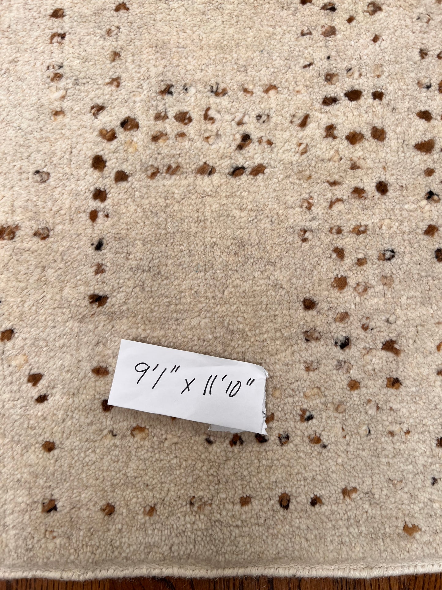 9'1" x 11'10"  Cream with random brown dots