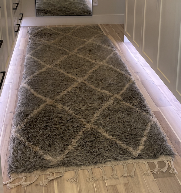 Pale gray and white Moroccan runner with fringe