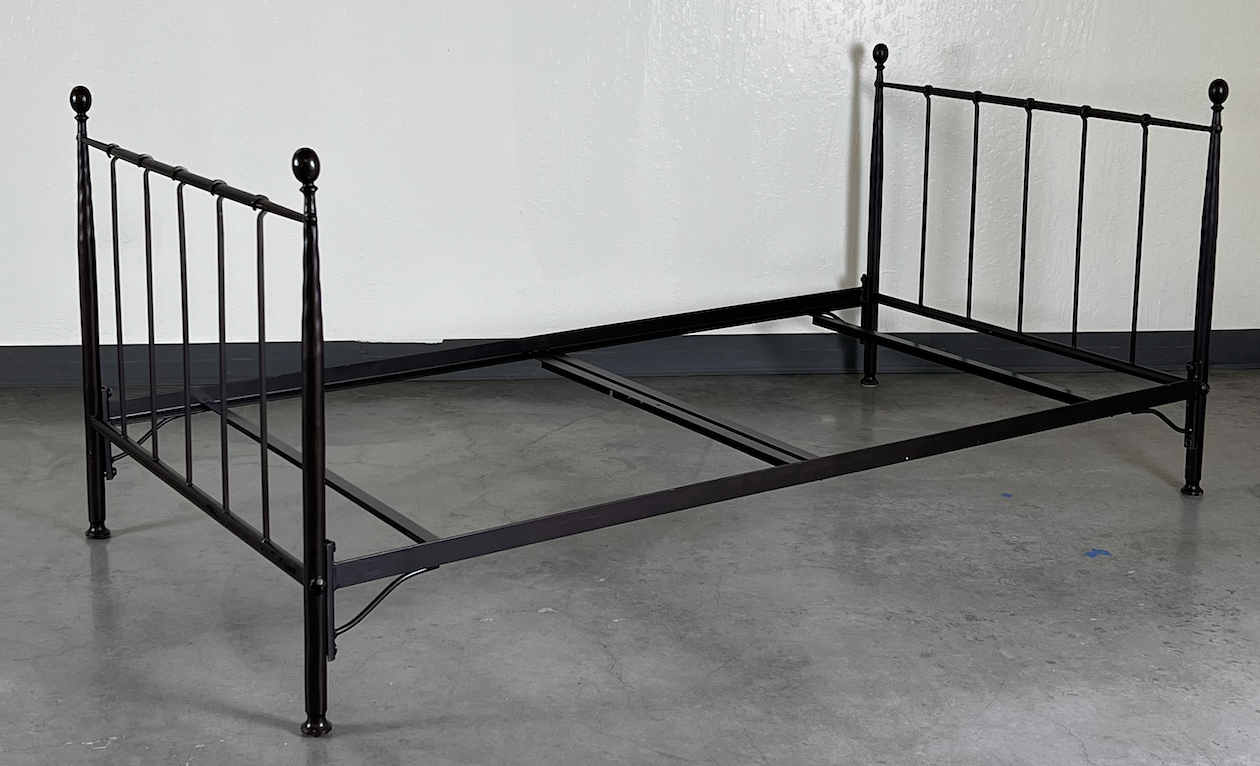 Black iron day bed, with low ends