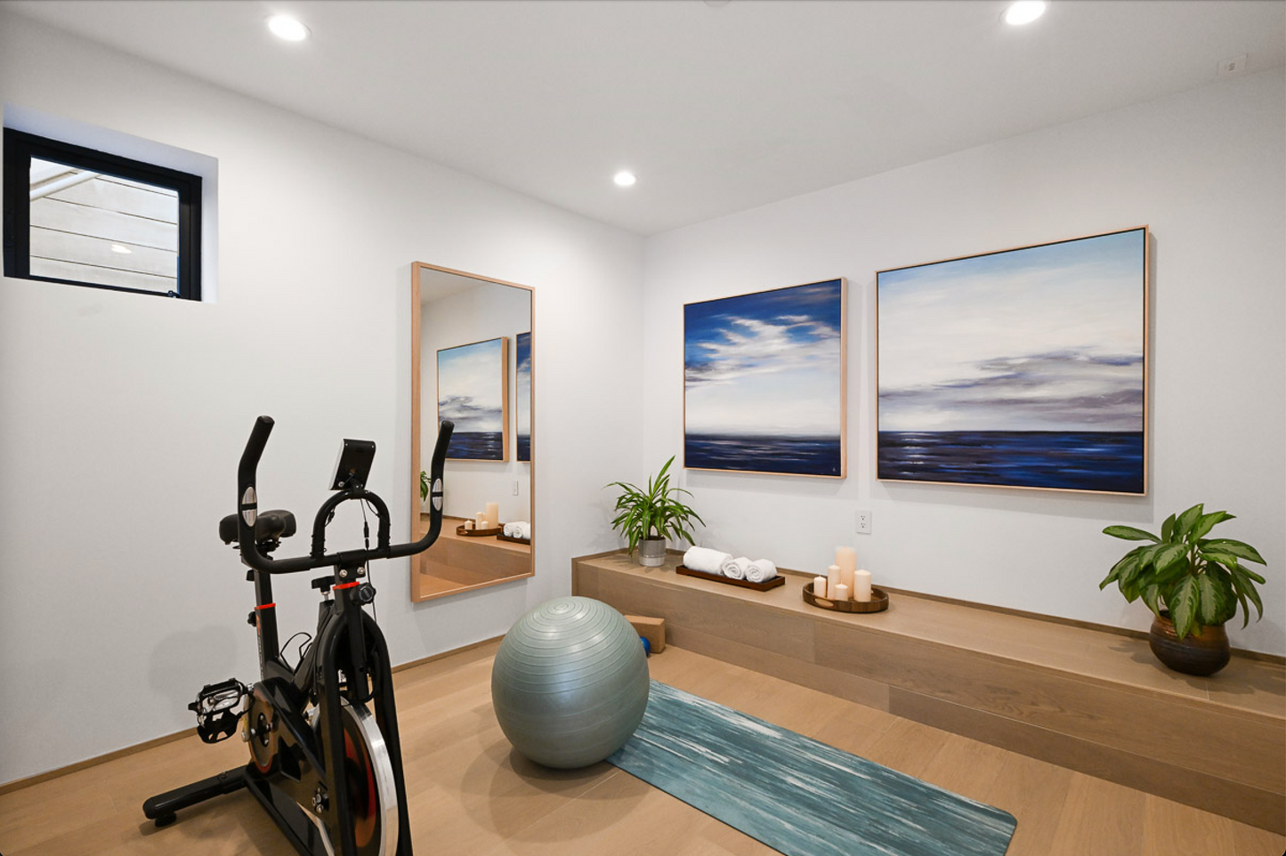 Stationary bike, gym mats, yoga mats, yoga blocks, balance balls, weights