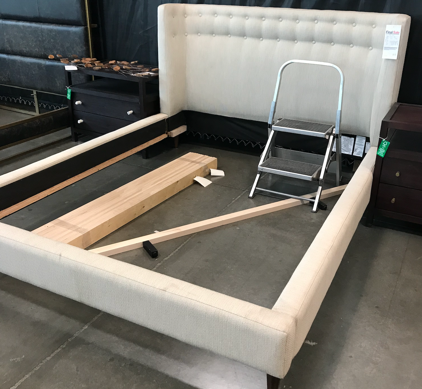 Queen cream upholstered curved shelter bed