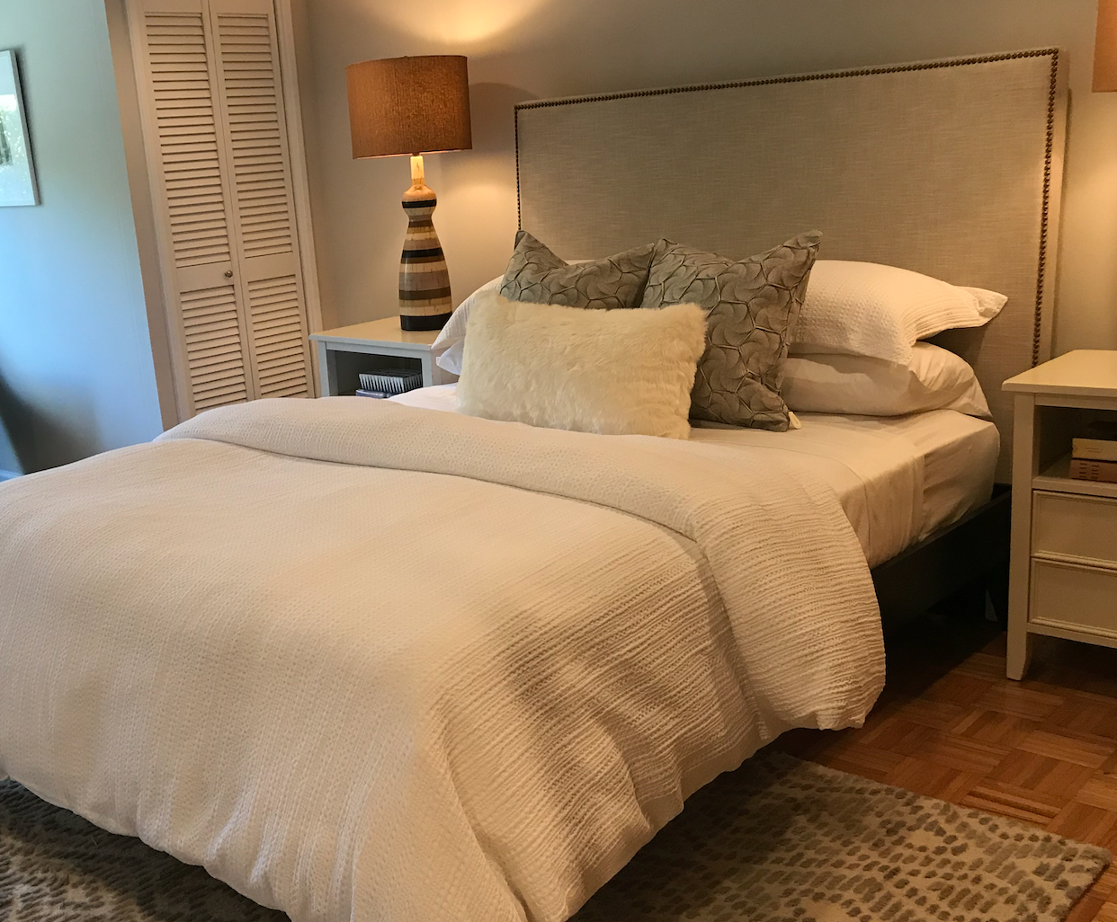 Queen, pale grey headboard w/ nailhead trim + platform