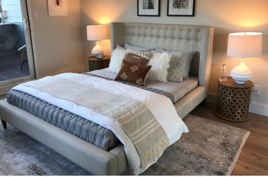 Queen cream upholstered curved shelter bed