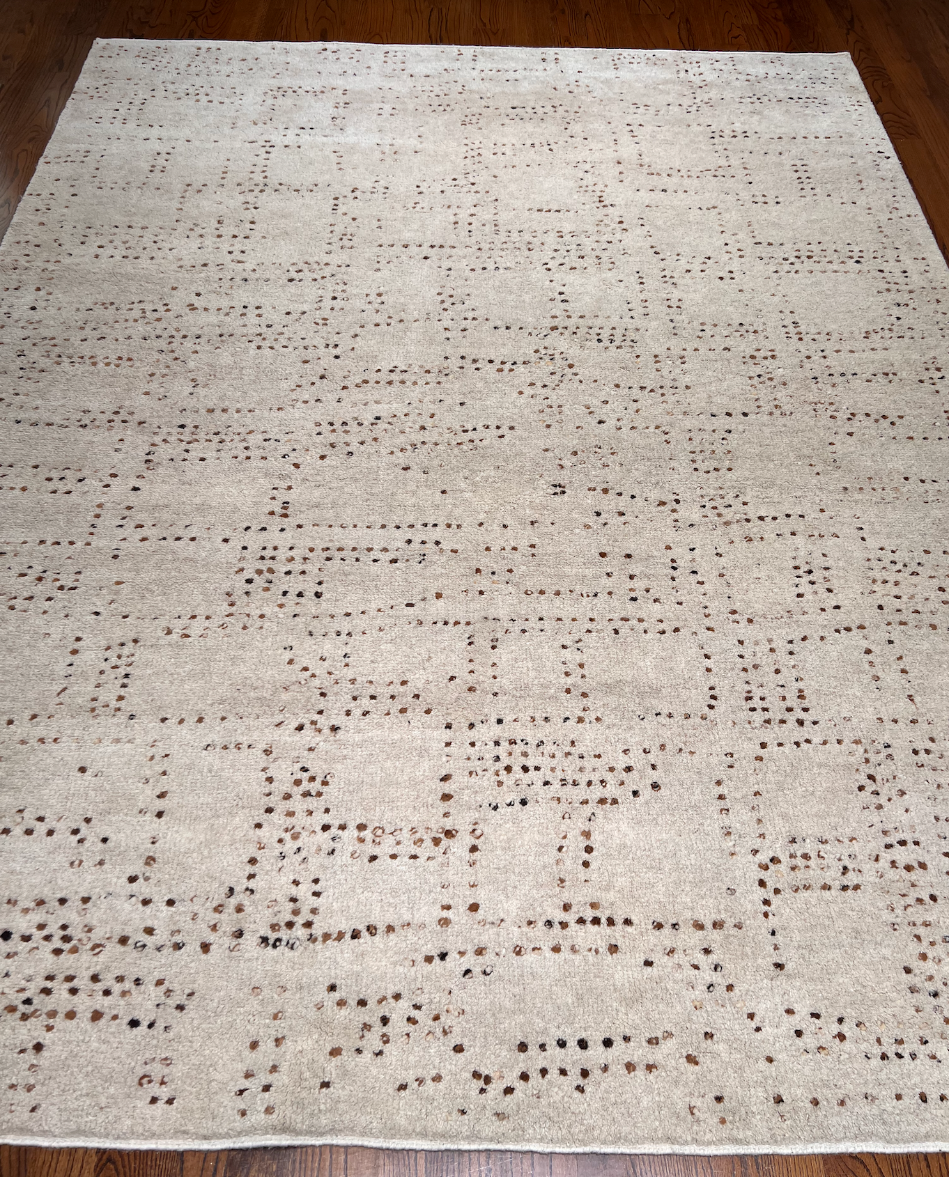 9'1" x 11'10"  Cream with random brown dots