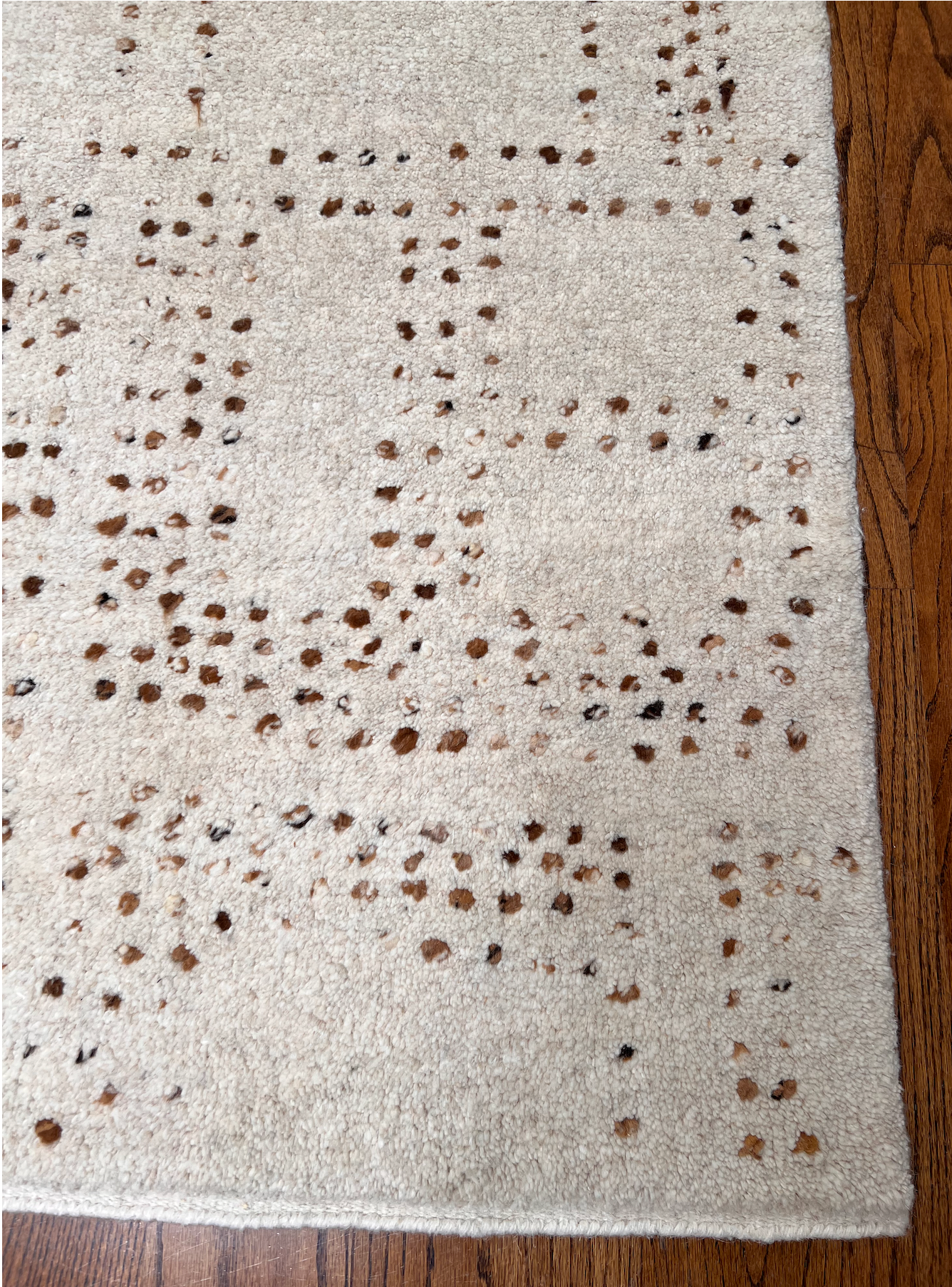 9'1" x 11'10"  Cream with random brown dots