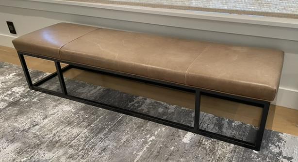 Brown leather bench