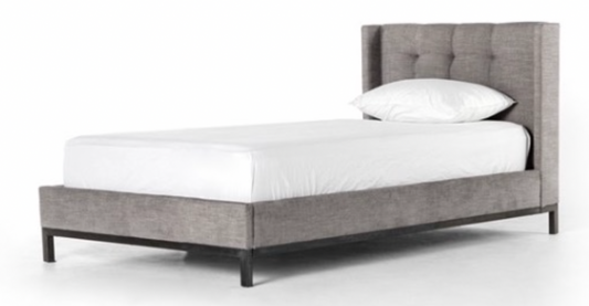 Gray tufted upholstered twin bed