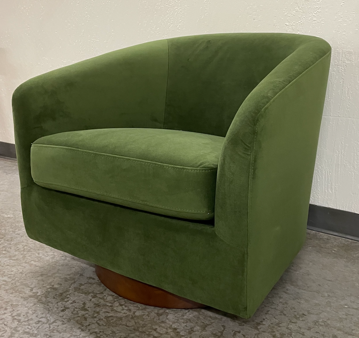 Green velvet swivel chair