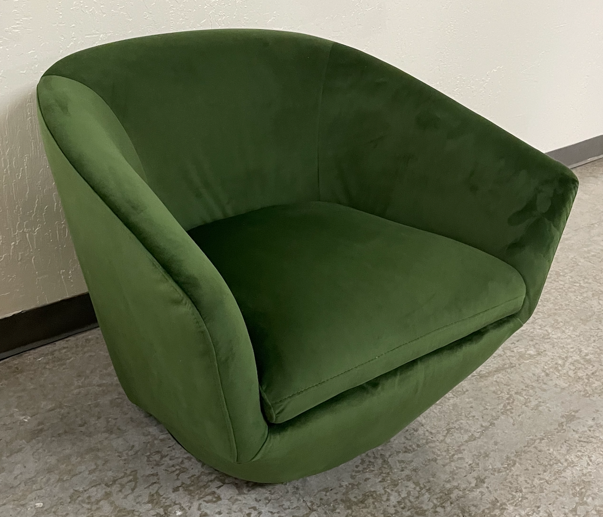 Green velvet swivel chair w/ sloped base