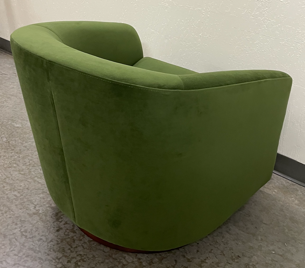 Green velvet swivel chair