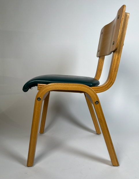 Vintage child chair with green seat