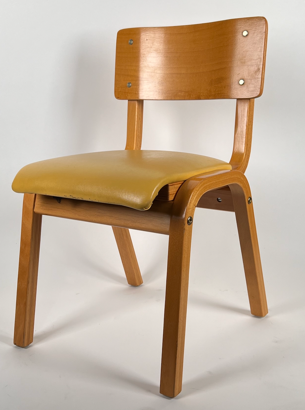 Vintage child chair with yellow seat
