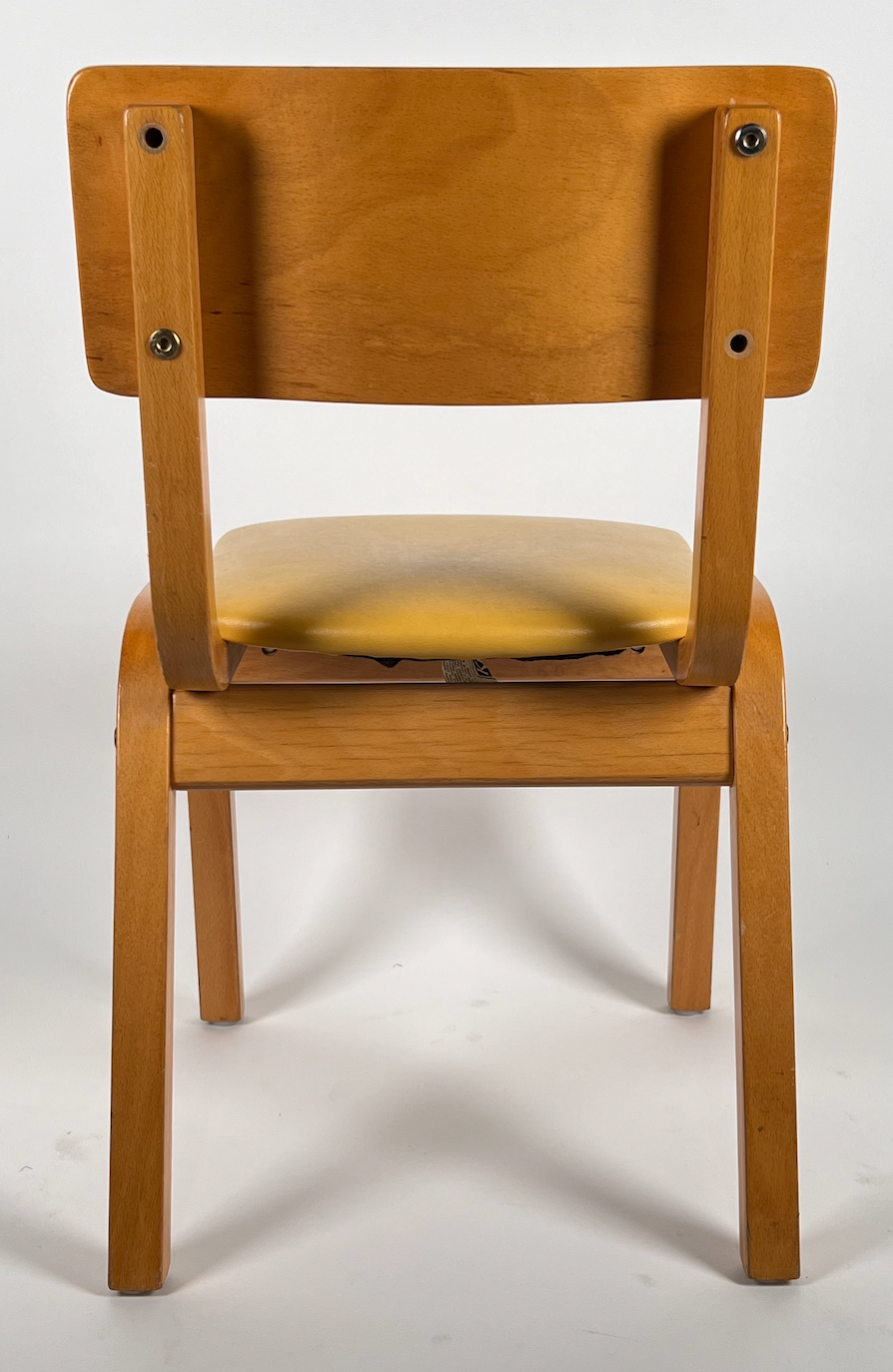Vintage child chair with yellow seat