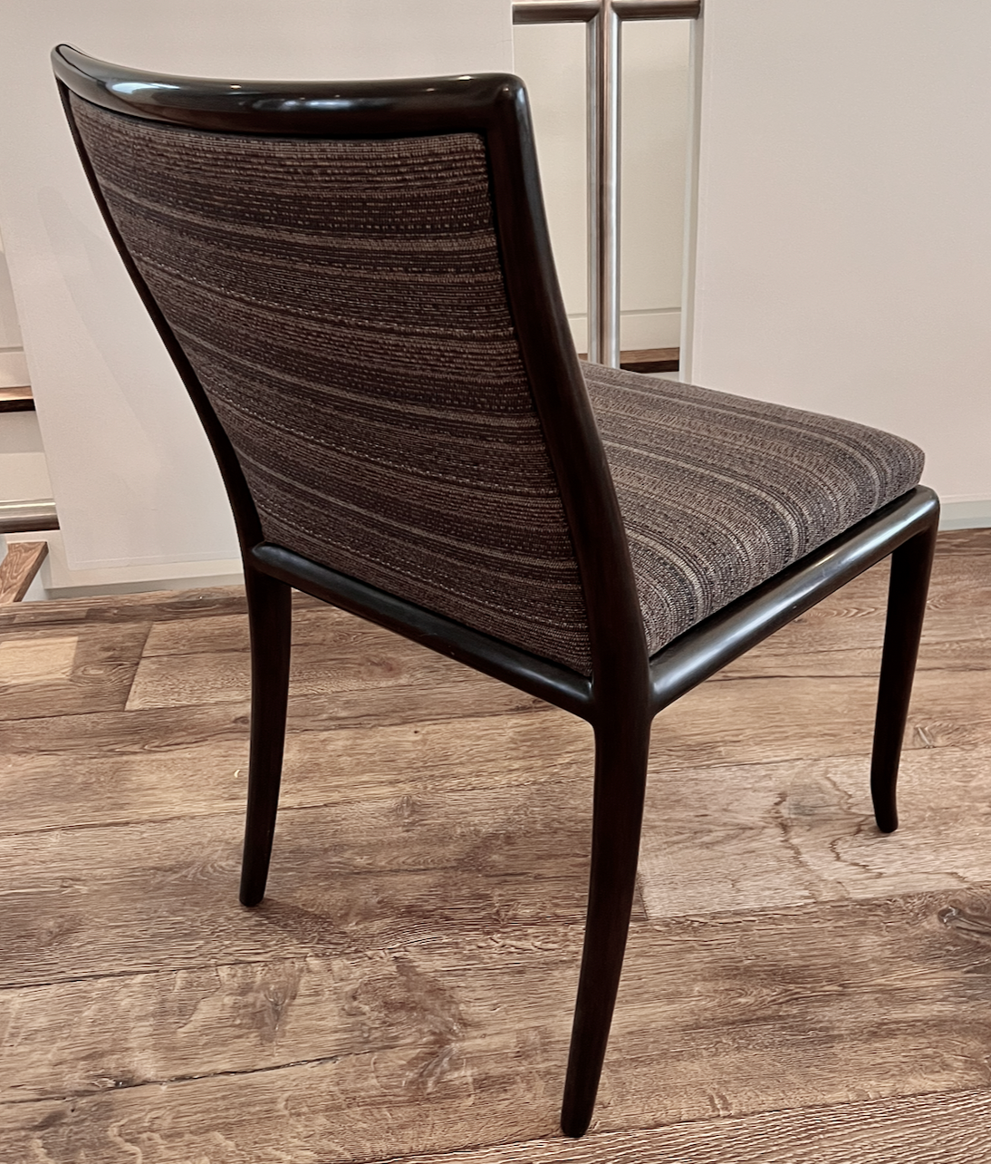 A. Rudin, dark wood, striped fabric