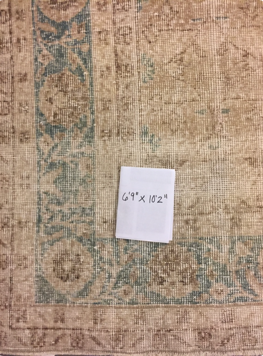 6'9" x 10'2" vintage shaved rug