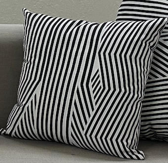 Black and white tweaked stripe accent pillow