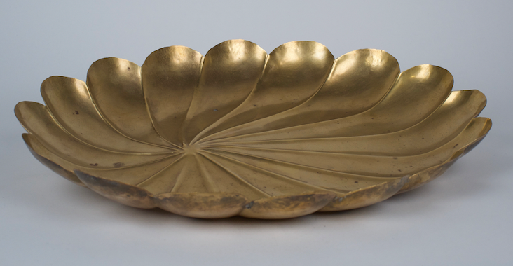 Vintage brass tray shaped like a flower or shell