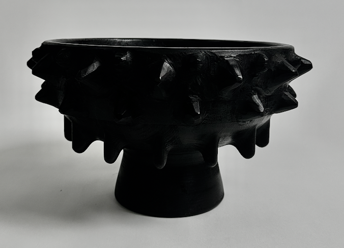 Black knobby pedestal bowl