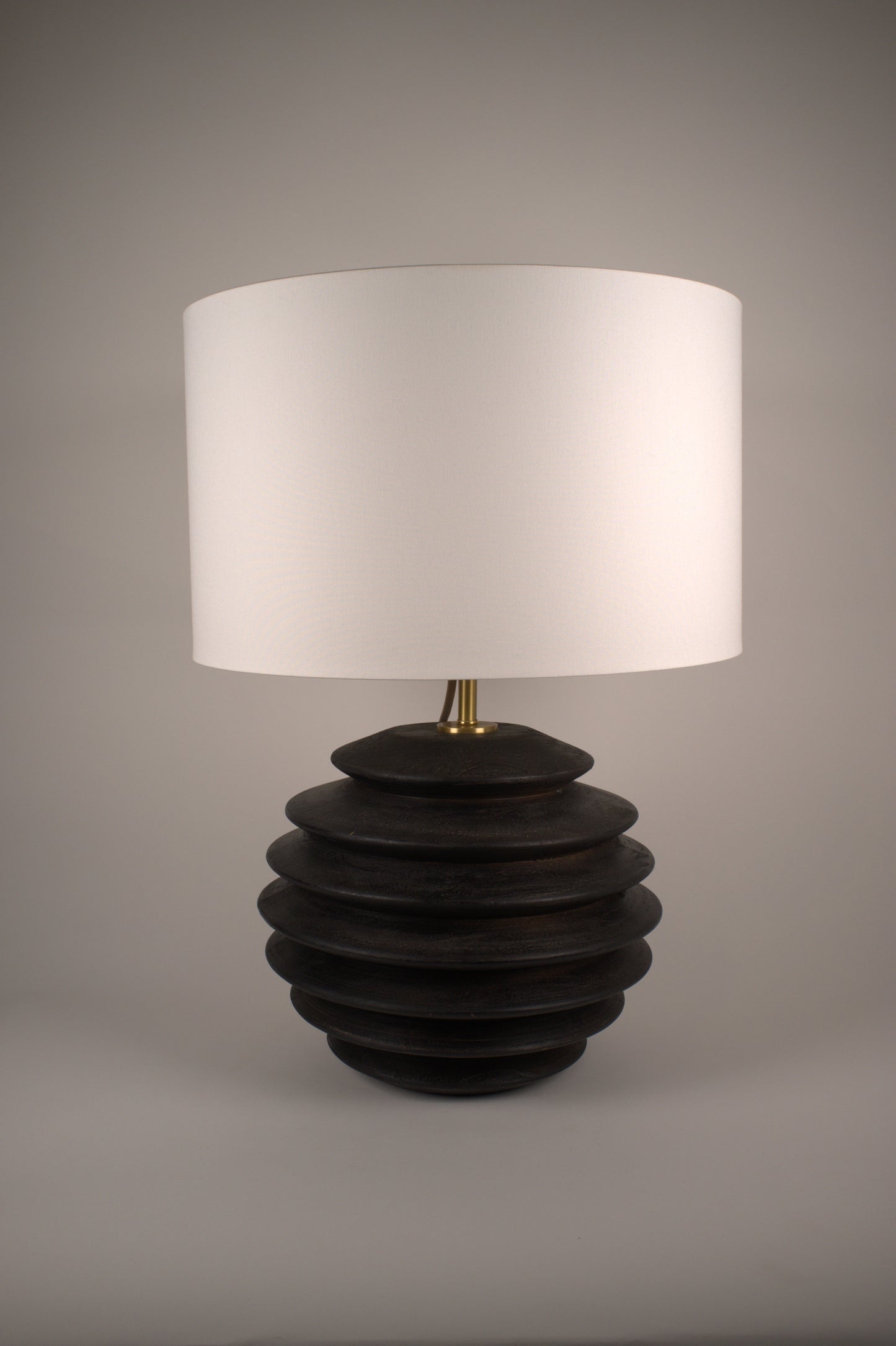 Round black wood base table lamp