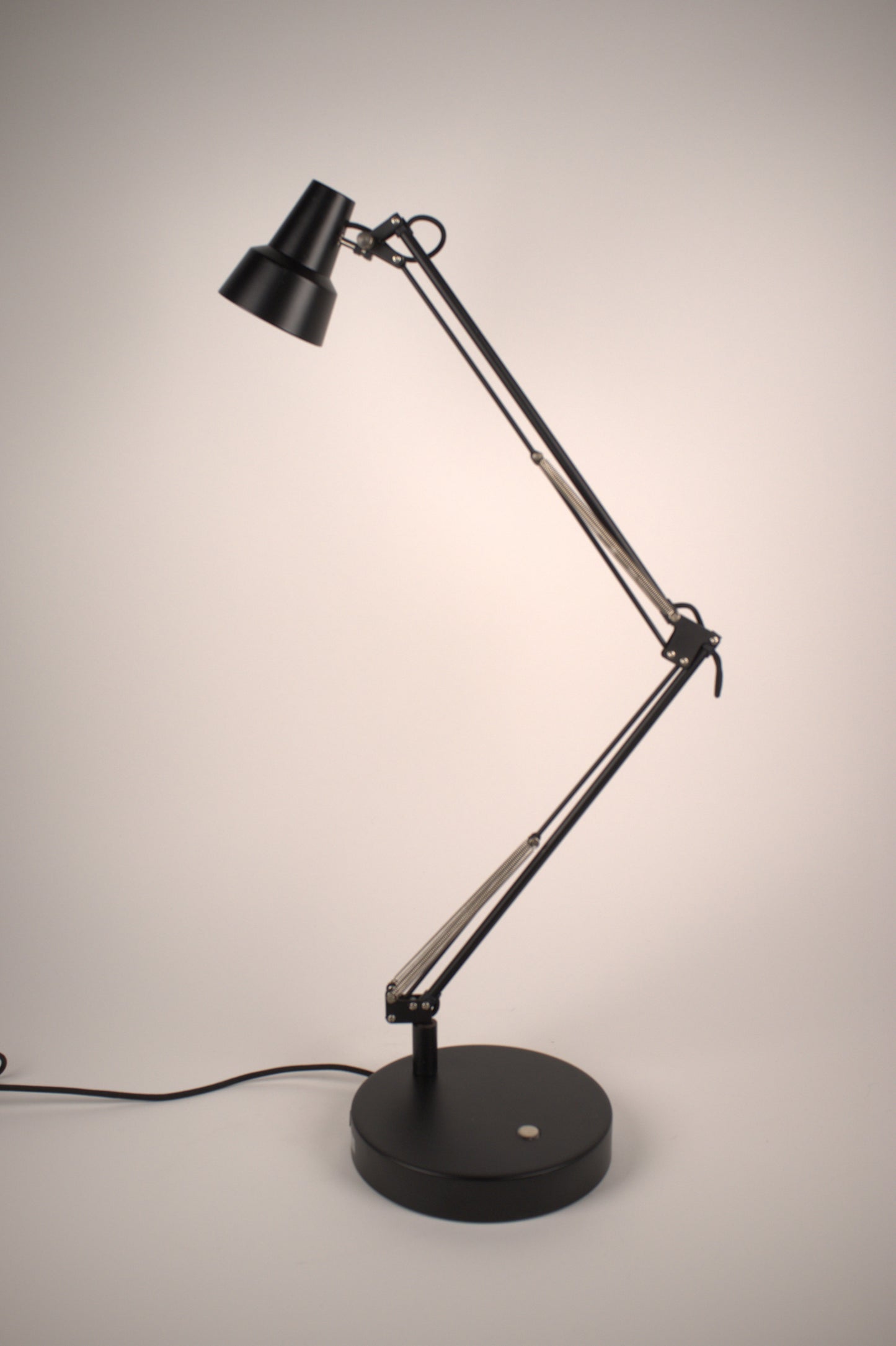 Black articulating desk lamp