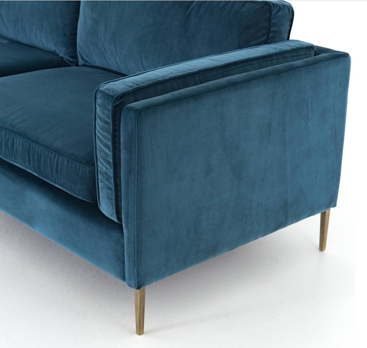 Sapphire / teal blue velvet sofa with brass legs, mid-century styling