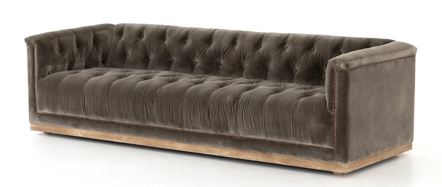 Brown tufted velvet library sofa with aged bronze nailhead trim