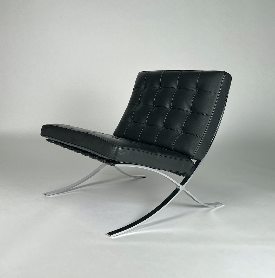 Black leather Knoll Barcelona chair with silver legs and back