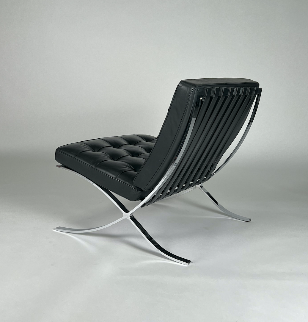 Black leather Knoll Barcelona chair with silver legs and back