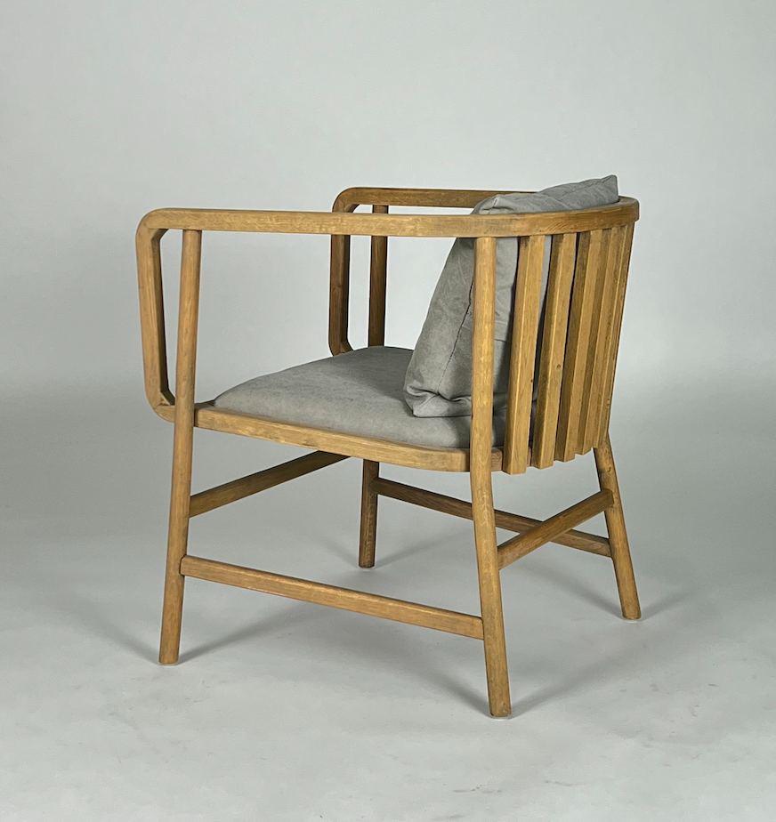 Taupe canvas and wood frame chair with slightly rounded back