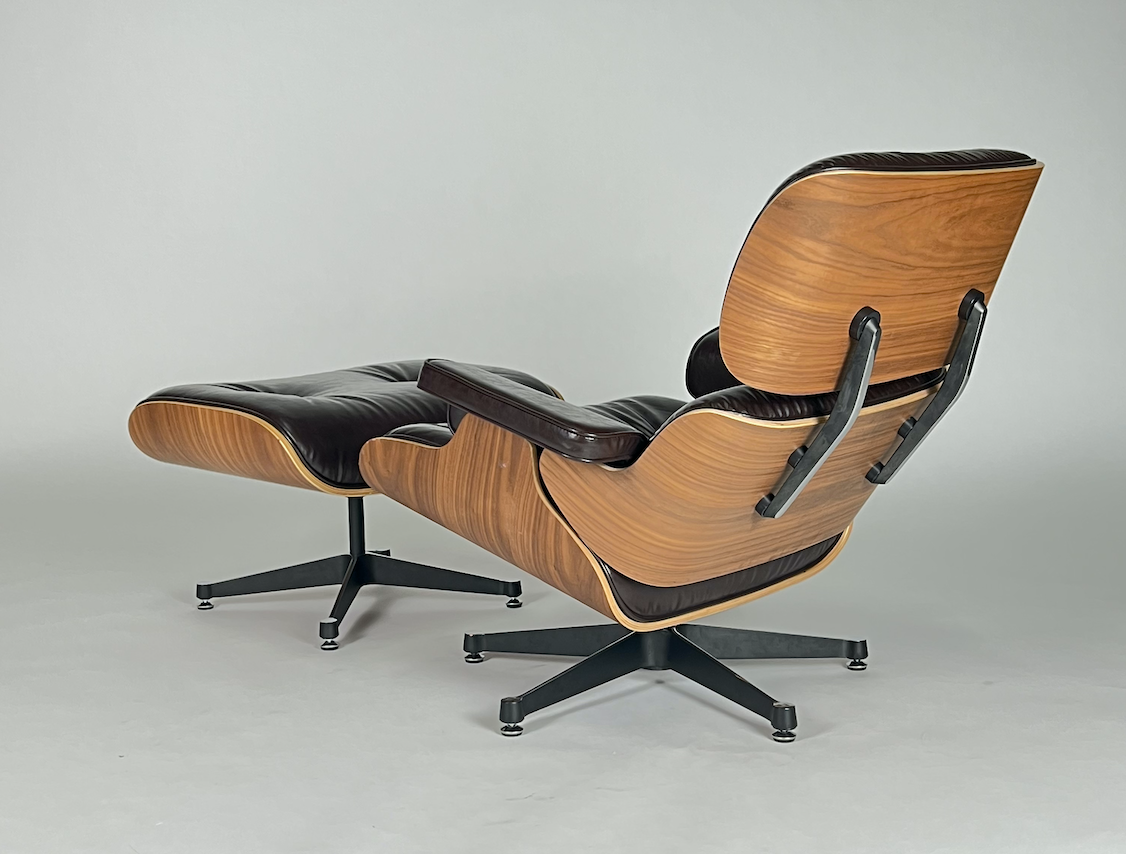 Dark brown leather Eames like lounge chair & ottoman