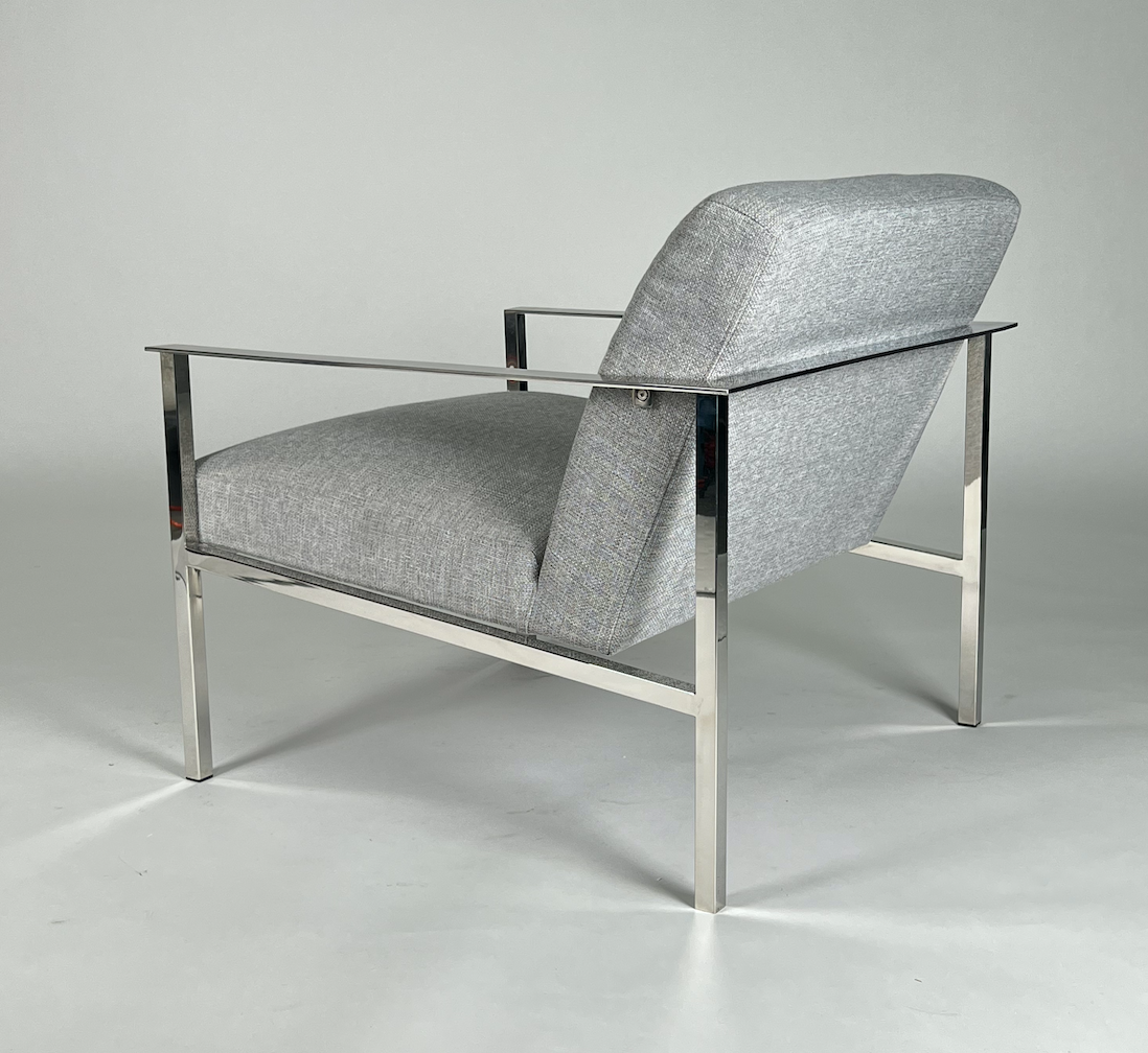 Gray tweedy fabric chair with chrome frame