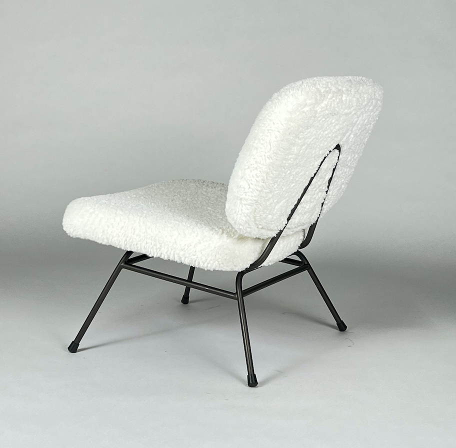 Ivory faux angora chair with black metal legs