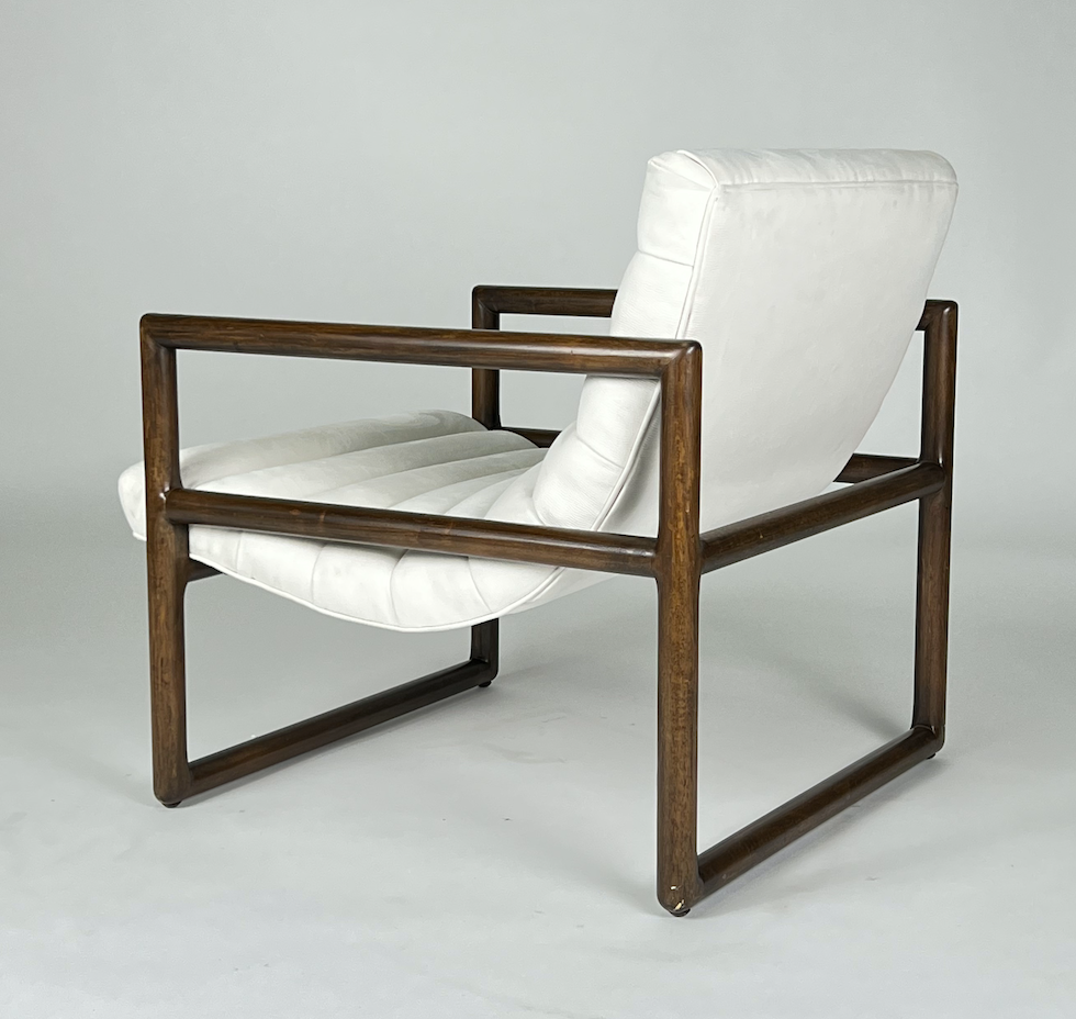 Off white fabric chair with dark wood square frame