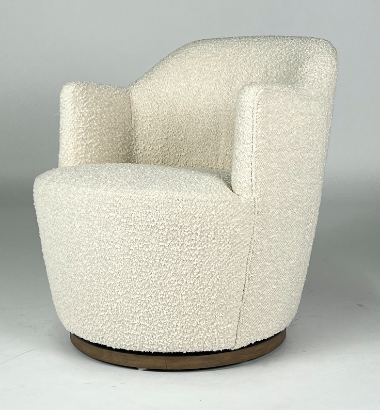 Cream boucle fabric swivel chair, wooden base