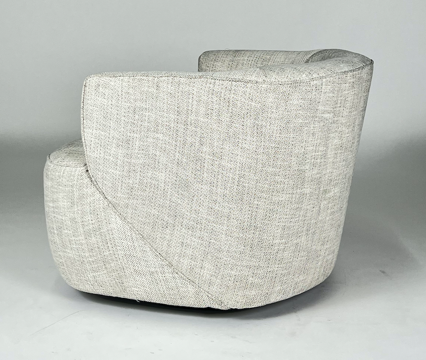 Off white with a touch of gray swivel chair