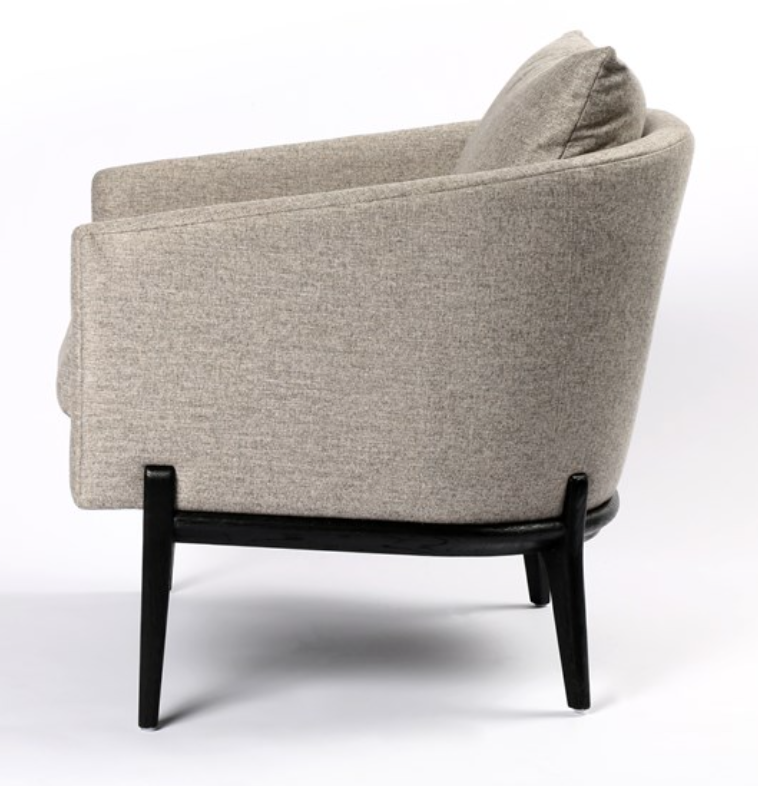 Light gray chair with subtle herringbone fabric, black frame