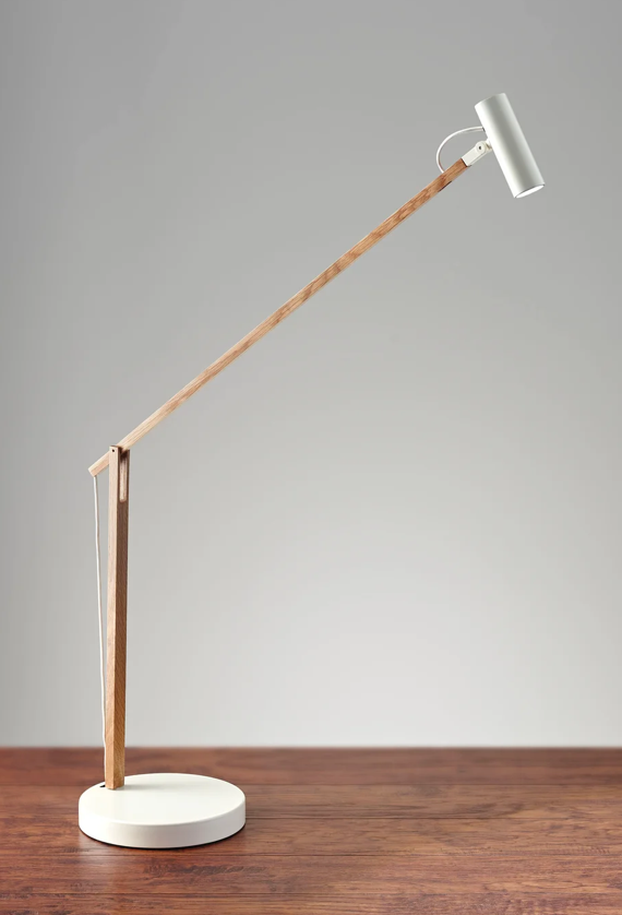 Crane desk or table lamp of slim wood with white head, articulates