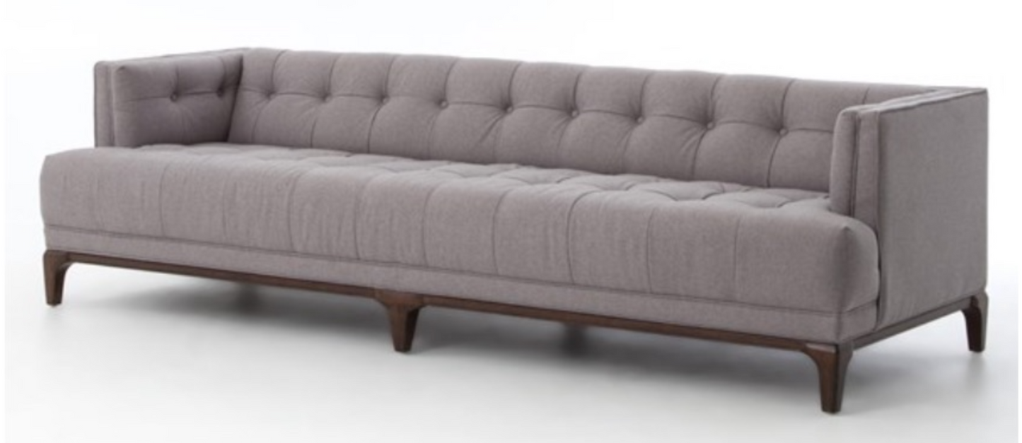 Soft gray sofa, blind tufting, walnut frame and legs, mid-century styling