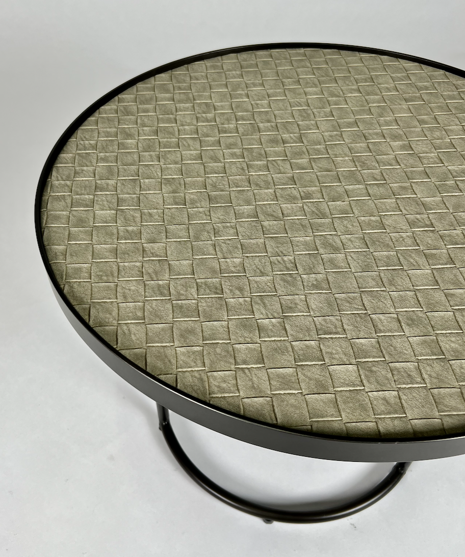 Taupe woven leather top, round table with black metal base