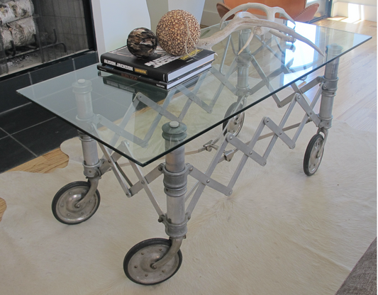 Coffin creeper coffee table with glass top